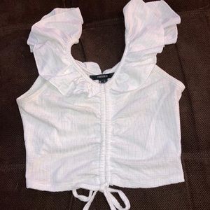 Stretchy white crop top with ruffled sleeve